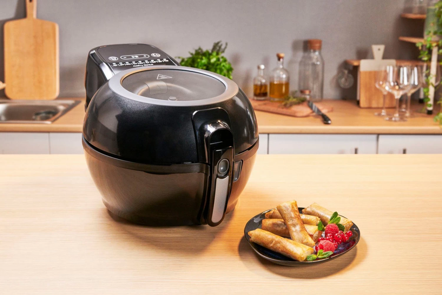 Tefal Airfryer FZ7738 ActiFry Genius + Inhoud 1,2 Kg, Timer, 9 Automatische Menu's, Roerarm-systeem, Zwart 7 Tefal Airfryer FZ7738 ActiFry Genius + Inhoud 1,2 Kg, Timer, 9 Automatische Menu's, Roerarm-systeem, Zwart - Afbeelding 7